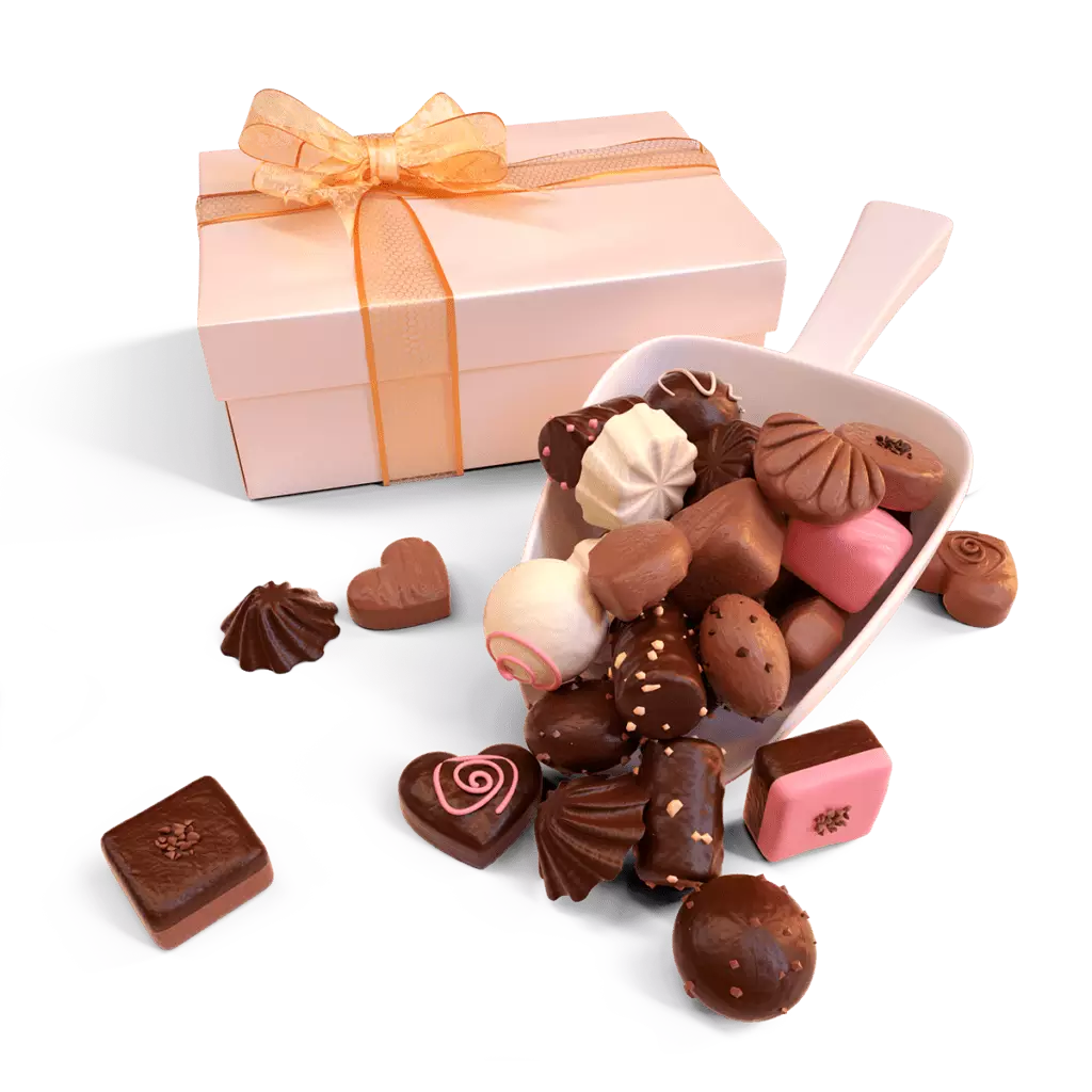 Chocolate box 1 A scoop of chocolates next to a gift box tied with a ribbon