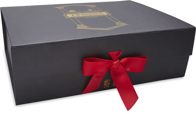 magnetic flap gift box with gold foiling top and red ribbon at front